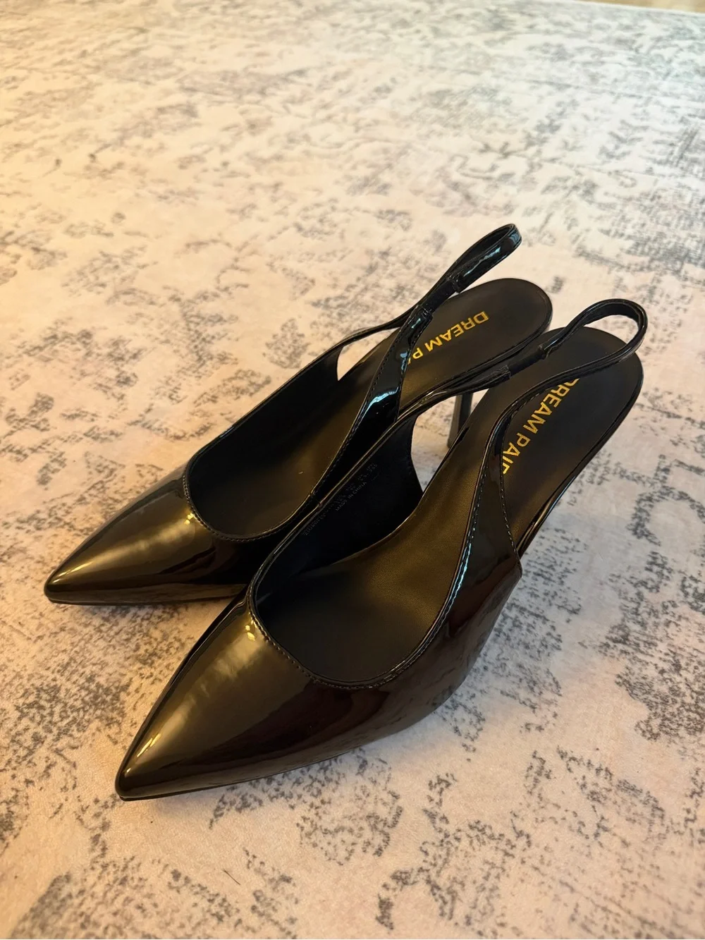 black slingback closed-toe kitten heels
